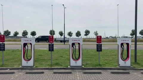 Tesla EV charging station wide 動画素材 313420260