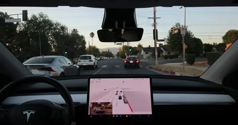 Tesla Full Self Drive Beta Turning on Suburban Intersection Stock Footage 205202183