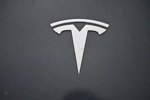 Tesla logo. Stock Photos