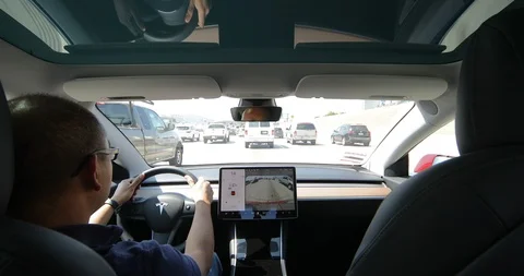 Tesla Model 3 on 405 Freeway Stock Footage 93247050