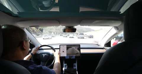 Tesla Model 3 on 405 Freeway Stock Footage 93247421