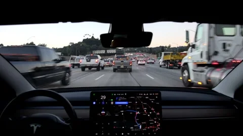 Tesla Model 3 Autopilot in Light Los Angeles Traffic in Pandemic Video stock 142280817