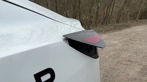 Tesla Model 3 charge port automatically Opening and closing Stock Footage 235451826