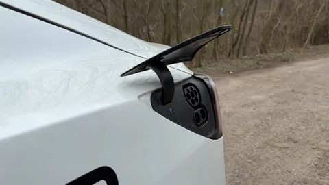 Tesla Model 3 charge port automatically Opening and closing Stock Footage 235451850