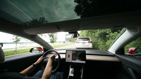 Tesla Model 3 Pulls Out Slow Motion Stock Footage 91321517