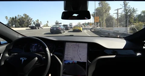 Tesla Model S in Autopilot Avoids Gore in Los Angeles Freeway Traffic Stock Footage 98571257