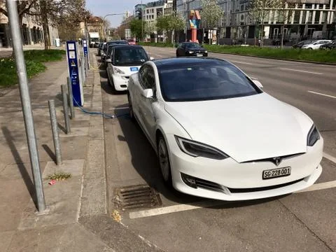 Tesla Model S being charged Stock Photos