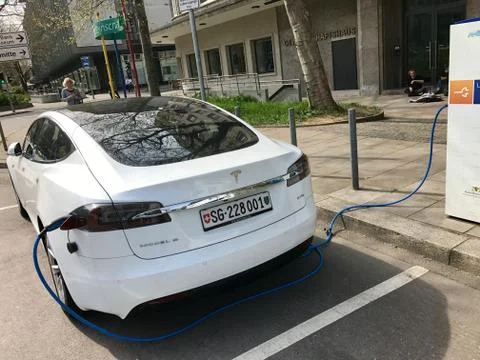 Tesla Model S being charged Stock Photos