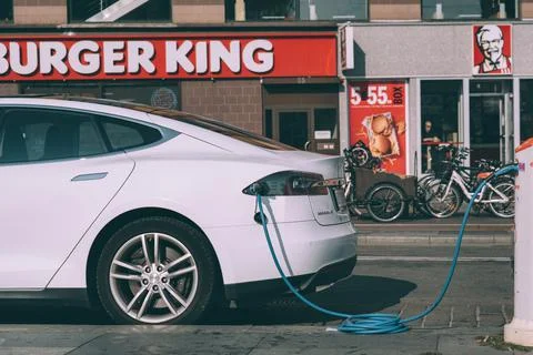 Tesla model S is charging at E-ON drive charging point in the centre of Copen Stock Photos
