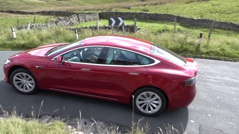 Tesla Model S cornering in slow motion Stock Footage