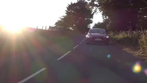 Tesla Model S with lens flare Stock Footage 80650461