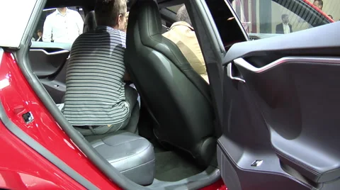 Tesla Model S P90D red in Paris 2016 Stock Footage 68420625
