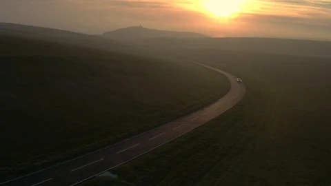 Tesla Model S static drone/ aerial shot sunset. Stock Footage
