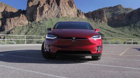 Tesla Model X - Falcon doors opening with Mountains in Background Stock-Footage 71011511