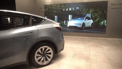 Tesla Model Y on display at a shopping mall in Bangkok. 스톡 동영상 333053746