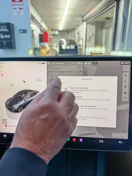 The Tesla Service screen on the Tesla App. Foto stock