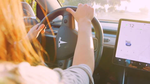 Tesla Sunset Drive Stock Footage 130296789
