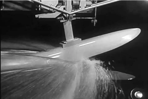 Test and examples of the aerodynamics of airplanes and boats in the 1940s Stock Footage 99843856