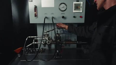 Test bench for diagnosing power steering racks under pressure Stock Footage 284545134