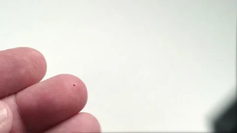 Test of blood sugar level with glucometer for diabetes, finger with blood drop Stock Footage 167186873