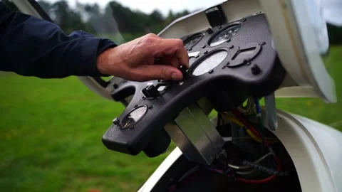 Test of the control unit in the cockpit of a small white airplane Stock Footage 237675113