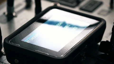 A test device for controlling the speed of a passenger plane in the hands of an Video stock 102617689