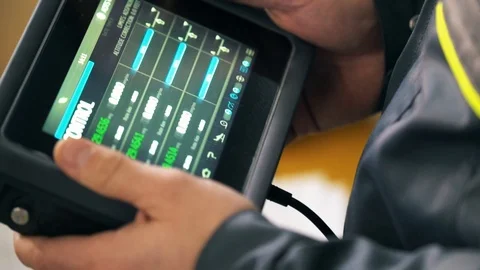 A test device for controlling the speed of a passenger plane in the hands of an Stock Footage 102617748