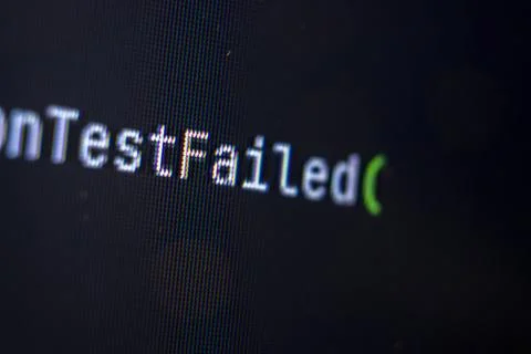 Test failed inscription on programming computer. QA concept Stock Photos