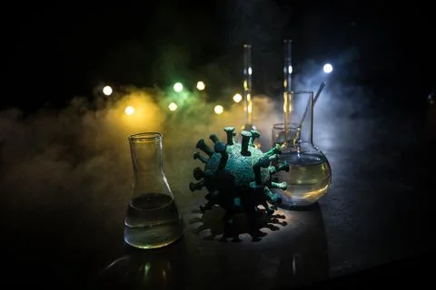 Test glass flask with solution in research laboratory. Science and medical ba Stock Photos
