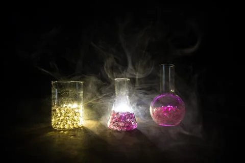 Test glass flask with solution in research laboratory. Science and medical ba Foto stock
