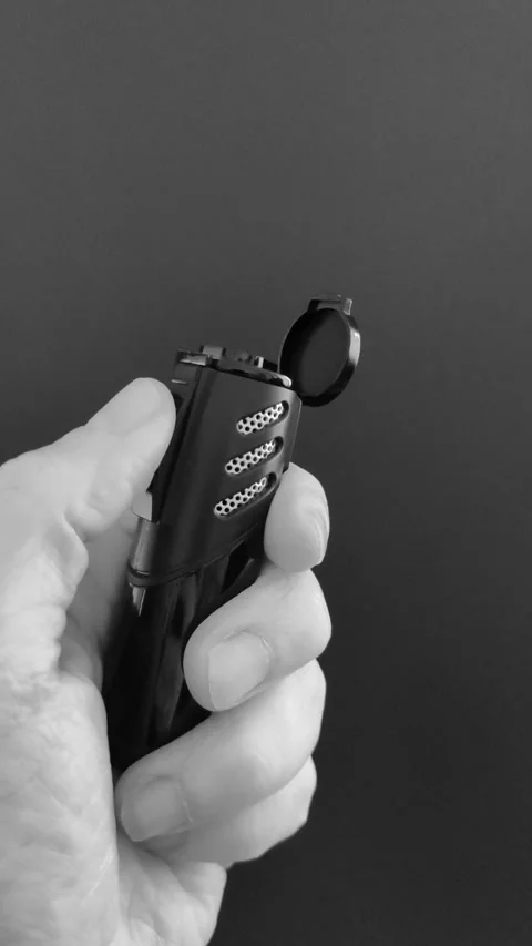 Test lighting of a lighter, with windproof flame, unloaded. Stock Footage 303224475