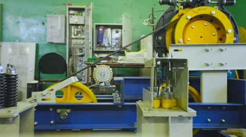 Test Moving Parts. Cable Movement on the Yellow Coil. Check the Working Parts. Stock Footage 62571603