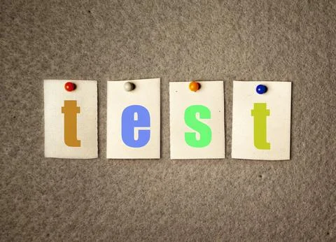 Test note on pin board Stock Photos