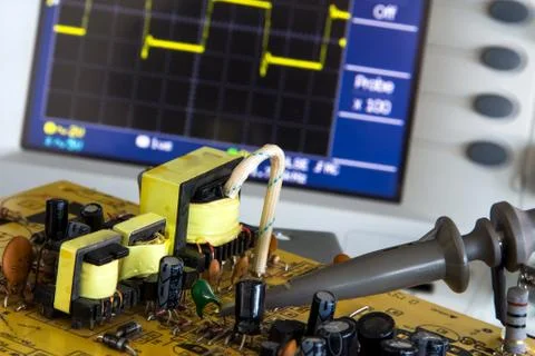 Test pulse power and voltage waveform on the oscilloscope Stock Photos