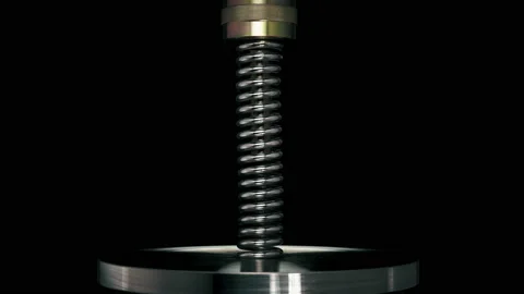 Test of reliability of a spring, compression and decompression by a hydraulic Video stock 95205478