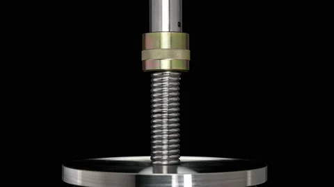 Test of reliability of a spring, compression and decompression by a hydraulic Stock Footage 95207795
