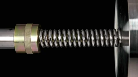 Test of reliability of a spring, compression and decompression by a hydraulic Stock Footage 95239715