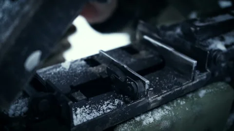 Test site for testing. The man charges the cartridges on the tank up view Video stock 115862436