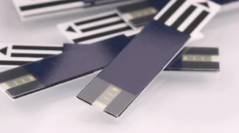 Test Strips Used by Diabetes Lying on a White Shiny Table Macro Close-up Stock Footage 56479328