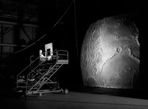 Test subject sitting at the controls: Project LOLA or Lunar Orbit and Landi.. Foto stock