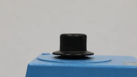 Test tube with yellow solution which is vortexed to make it homogeneous Stock Footage 127474761