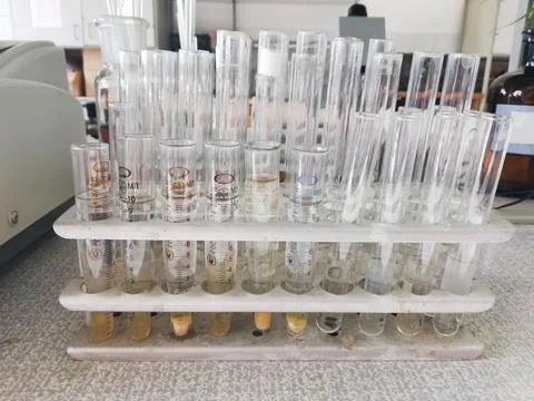 Test tubes and flasks in lab. Chemical Analysis Laboratory. Stock Photos