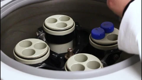 Test tubes being put into a centrifuge 스톡 동영상 315761444