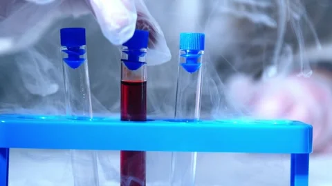 Test tubes with blood sample in dry ice Stock Footage 308929020