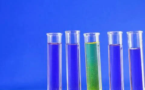 Test tubes blue and yellow Stock Photos