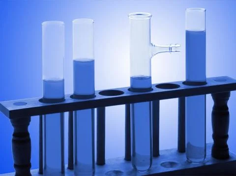 Test tubes on blue background Foto stock