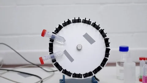 Test tubes in a centrifuging machine Stock Footage 255196131