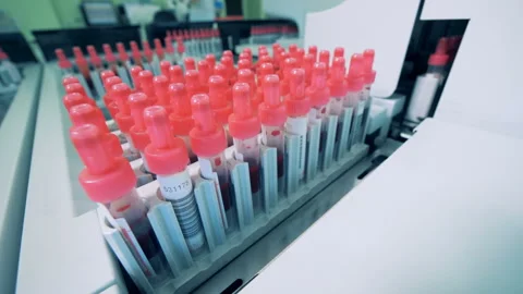 Test tubes filled with blood getting transported Stock Footage 92664894