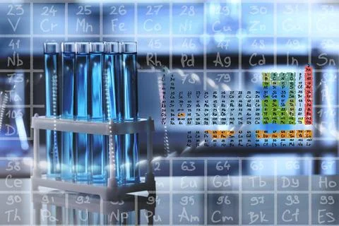 Test tubes with light blue liquid in laboratory and periodic table of chemi.. Stock Photos