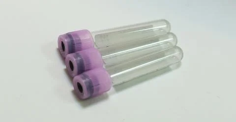 Test tubes with pink cap Stock Photos